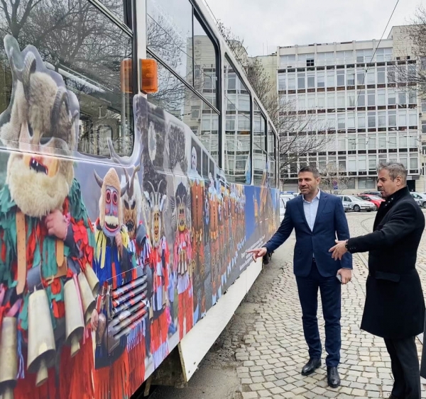 A trolleybus and a tram with collages of cultural heritage sites in Sofia